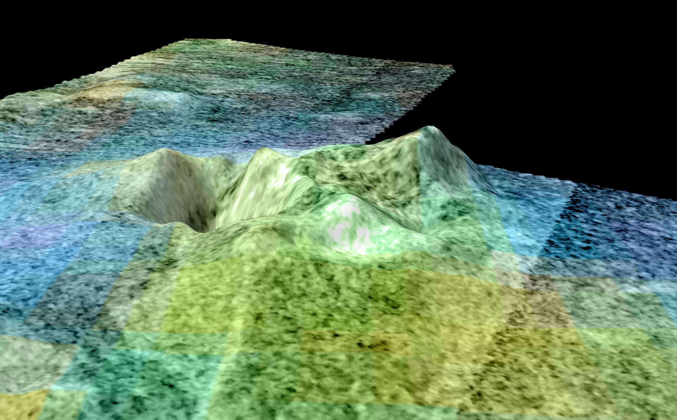 Doom Mons and Sotra Patera, two remarkable features on the surface of Saturn. Topography has been vertically exaggerated by a factor of 10. The false color shows different surface material compositions as detected by Cassini's visual and infrared mapping spectrometer. Image credits: NASA/JPL.